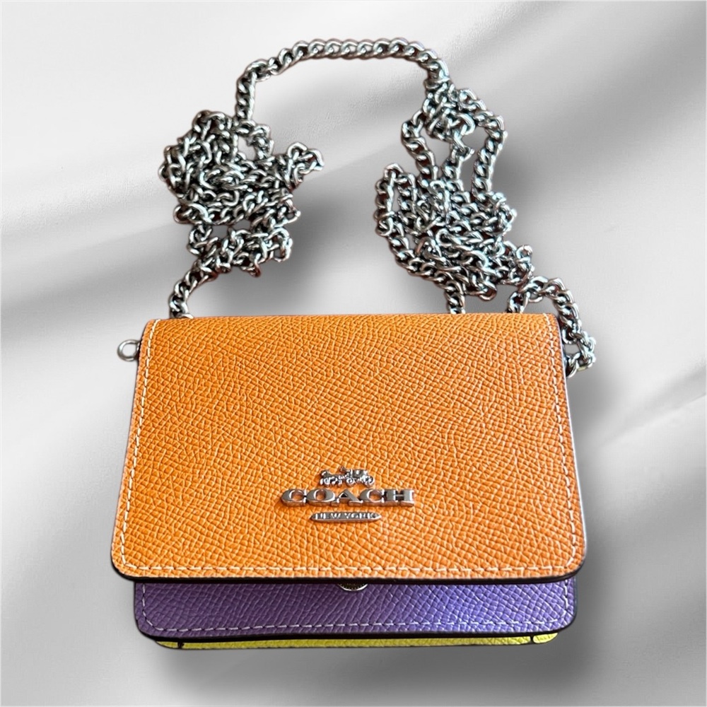 Coach Mini Wallet On A Chain
4” X 3” X 1” EUC